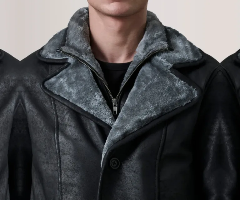 Cai Distressed Black Leather Shearling Coat — Macro Hardware & Seam Construction
