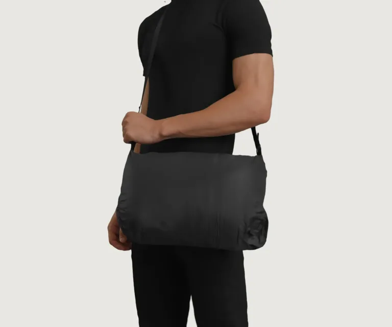 Erico Black Hooded Puffer Jacket — Quarter Angle Profile & Contoured Sleeve Detail