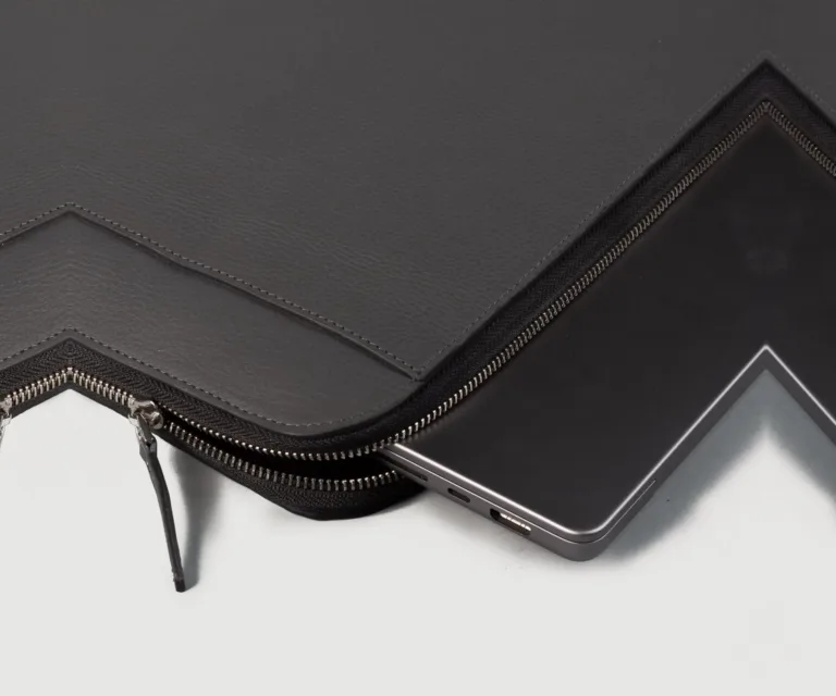 The Baxter Grey Leather Laptop Sleeve — Hardware & Texture Macro