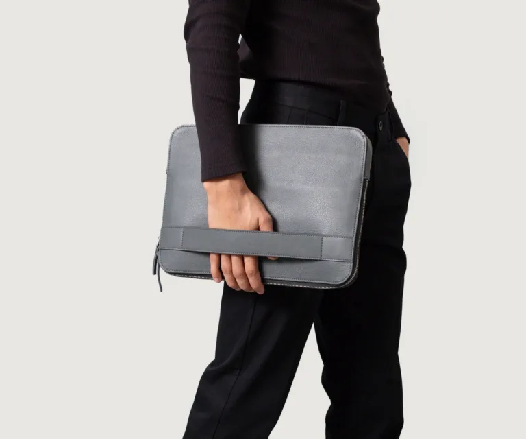 The Baxter Grey Leather Laptop Sleeve — Editorial Presentation View