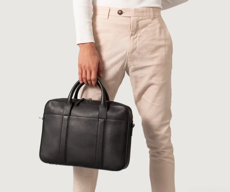 The Captain Black Leather Briefcase Luxury Handcrafted Leather Bag — Scale & Carrying Perspective Presentation