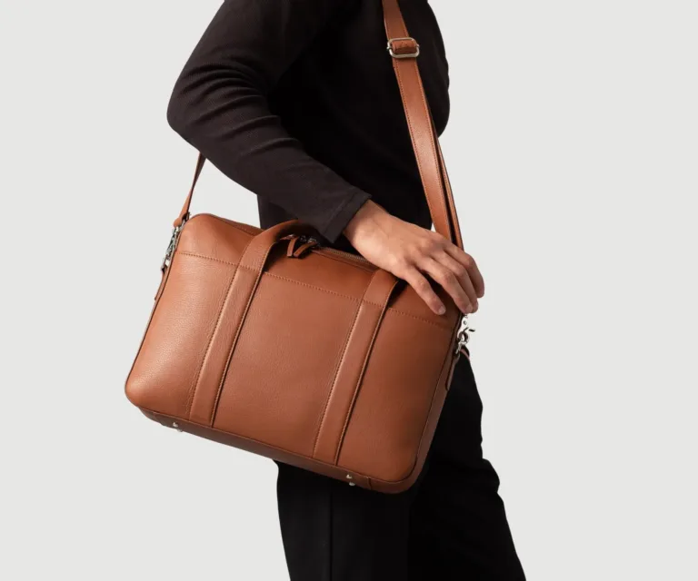 The Captain Brown Leather Briefcase Luxury Handcrafted Leather Bag — Scale & Carrying Perspective Presentation