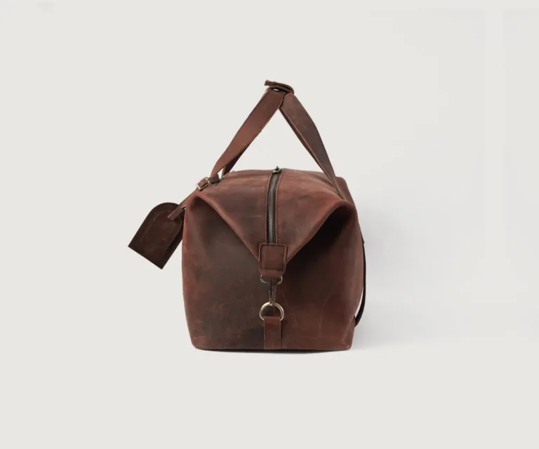 The Dale Duffle Vintage Distressed Brown Leather Duffle Bag Luxury Handcrafted Leather Bag — Rear Profile & Trolley Strap Reinforcement