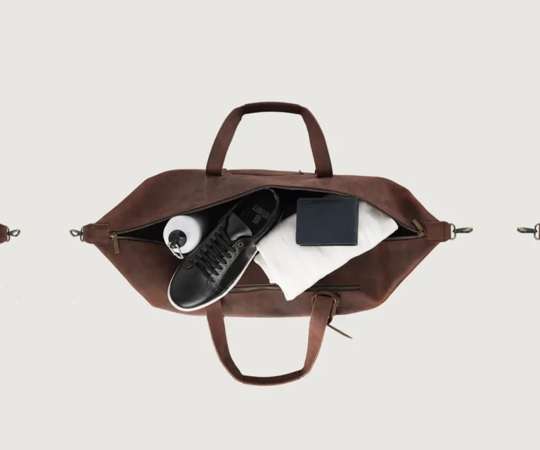 The Dale Duffle Vintage Distressed Brown Leather Duffle Bag Luxury Handcrafted Leather Bag — Scale & Carrying Perspective Presentation