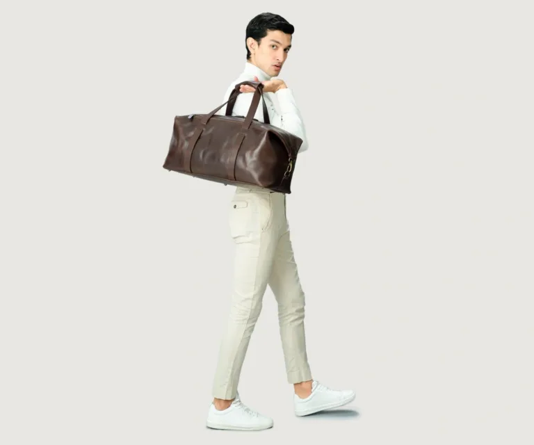 The Dale Vintage Brown Leather Duffle Bag Luxury Handcrafted Leather Bag — Scale & Carrying Perspective Presentation