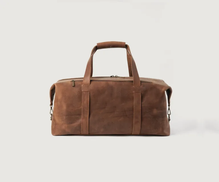 The Dale Vintage Tan Brown Leather Duffle Bag Luxury Handcrafted Leather Bag — Scale & Carrying Perspective Presentation