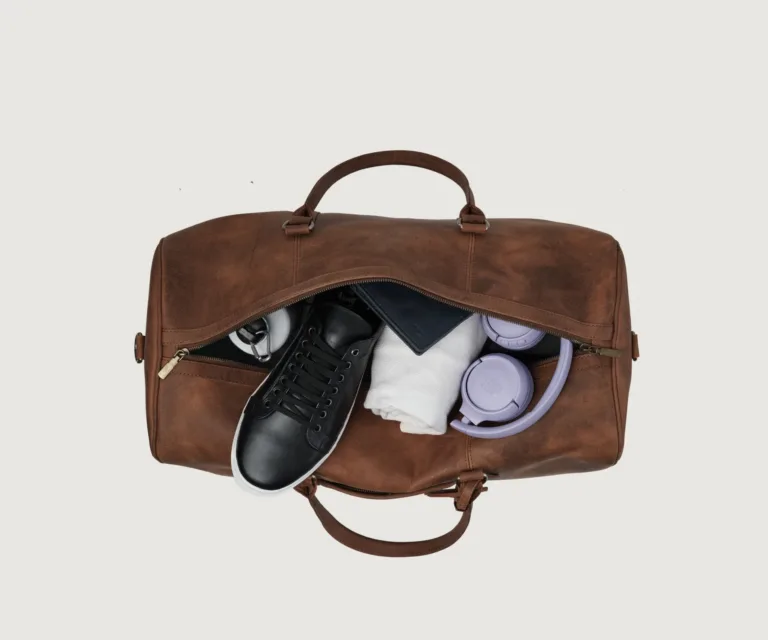 The Darrio Vintage Tan Brown Leather Duffle Bag Luxury Handcrafted Leather Bag — Scale & Carrying Perspective Presentation