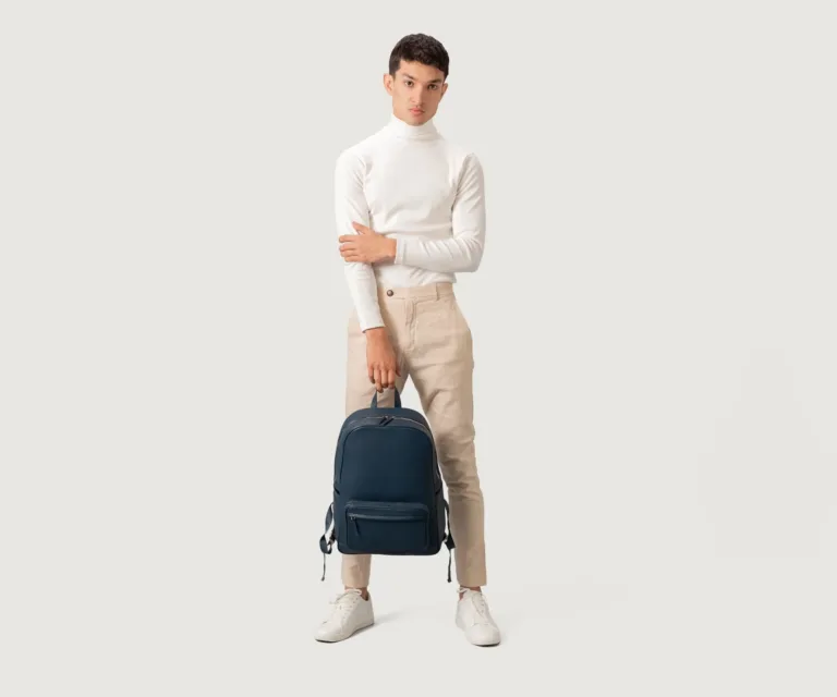 The Philos Midnight Blue Leather Backpack Luxury Handcrafted Leather Bag — Three-Quarter Perspective & Silhouette