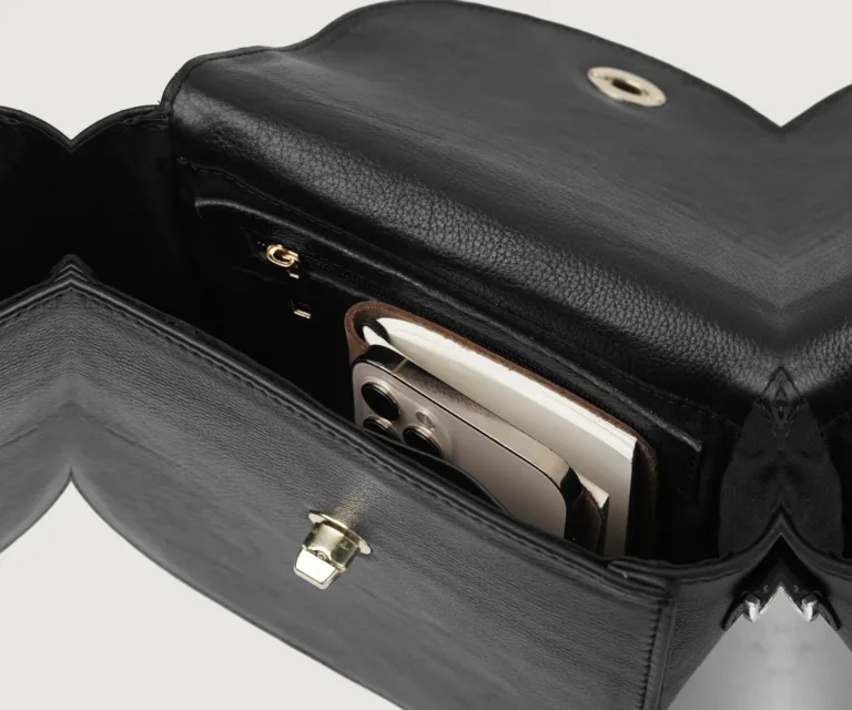 The Sandra Black Leather Saddle Bag Luxury Handcrafted Women's Bag — Scale & Carrying Perspective Presentation