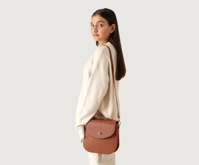 The Sandra Brown Leather Saddle Bag Luxury Handcrafted Women's Bag — Three-Quarter Perspective & Silhouette