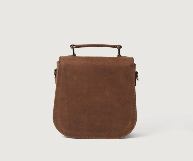 The Sandra Vintage Tan Leather Saddle Bag Luxury Handcrafted Women's Bag — Scale & Carrying Perspective Presentation
